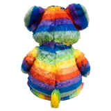 Back view of a plush rainbow striped bear against a white background.
