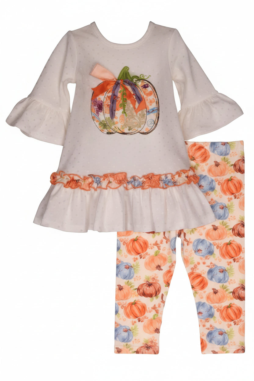 Children's outfit with a top and leggings featuring a floral pattern.