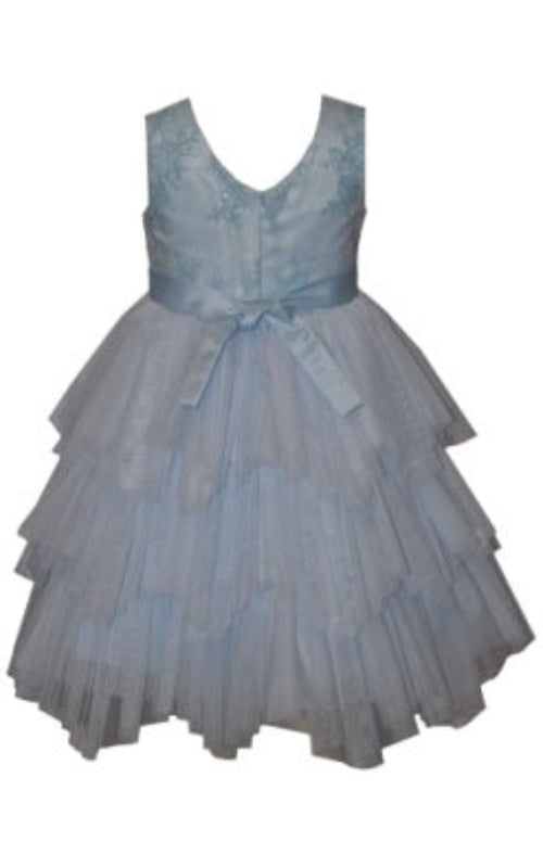 Light blue dress with a layered skirt and bow detail on a white background