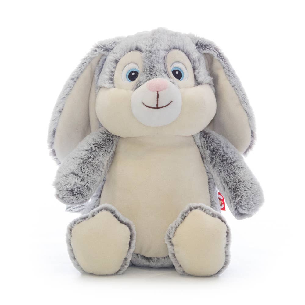 Grey stuffed bunny with blue eyes on a white background