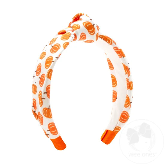 Knot style headband with pumpkin pattern.