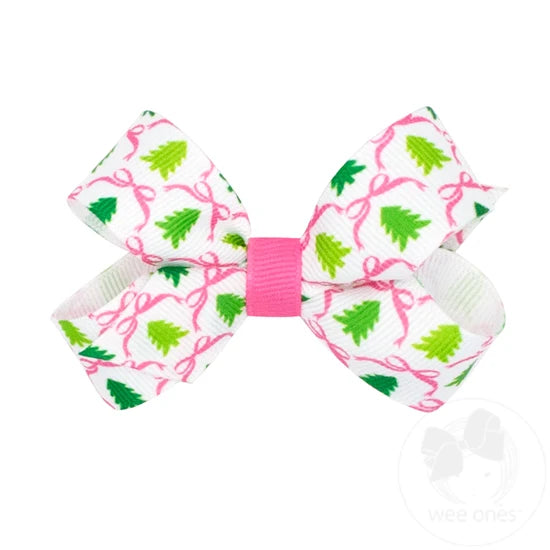 White bow with christmas tree print and pink center
