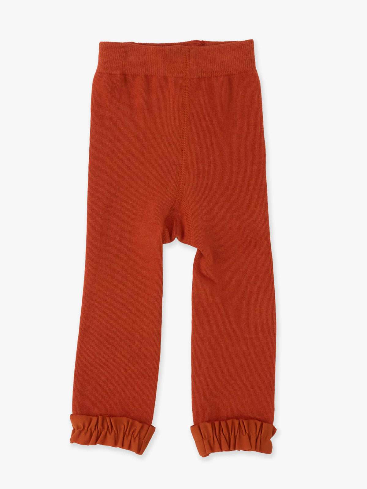 A pair of rust-orange knit baby leggings with an elastic waistband and gathered elastic cuffs, shown flat on a light gray background.