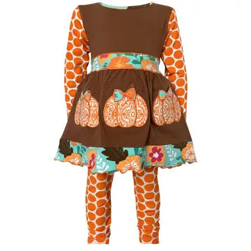 Children's outfit with brown top and leggings featuring pumpkins and floral patterns on a white background.