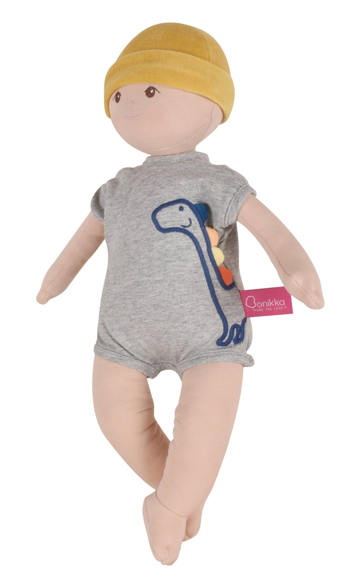 Doll wearing a gray outfit with a dinosaur design and a yellow hat on a white background