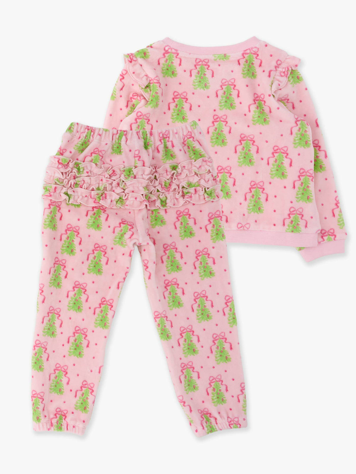 A two-piece children's pajama set featuring a long-sleeve top and matching pants in light pink, both printed with a green Christmas tree motif and decorated with ruffles at the waist.