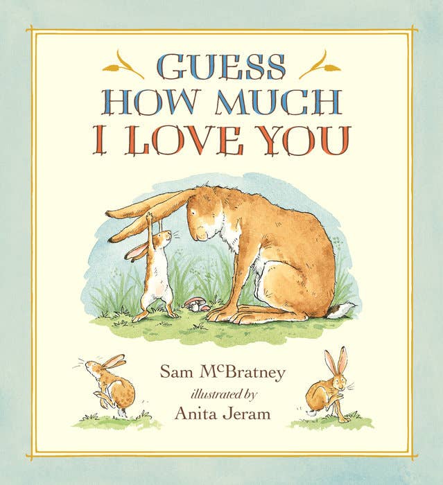 Front cover of picture book with a blue background and two rabbits on the front with the title"Guess How Much I Love You" across the top. 