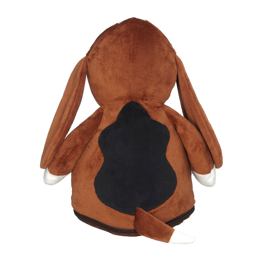 Back view of a plush brown & white hound dog with black markings on the back and white tipped paws and tail against a white background. 