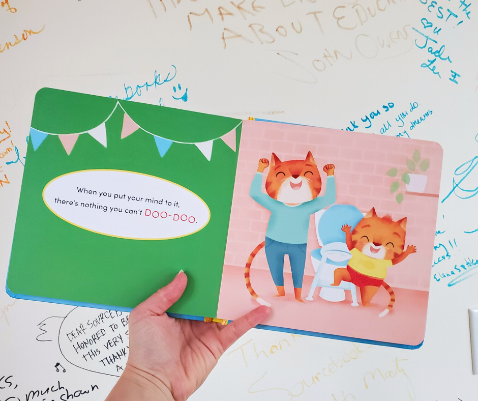 Children's book with a colorful illustration of two animals on a white surface with writing.