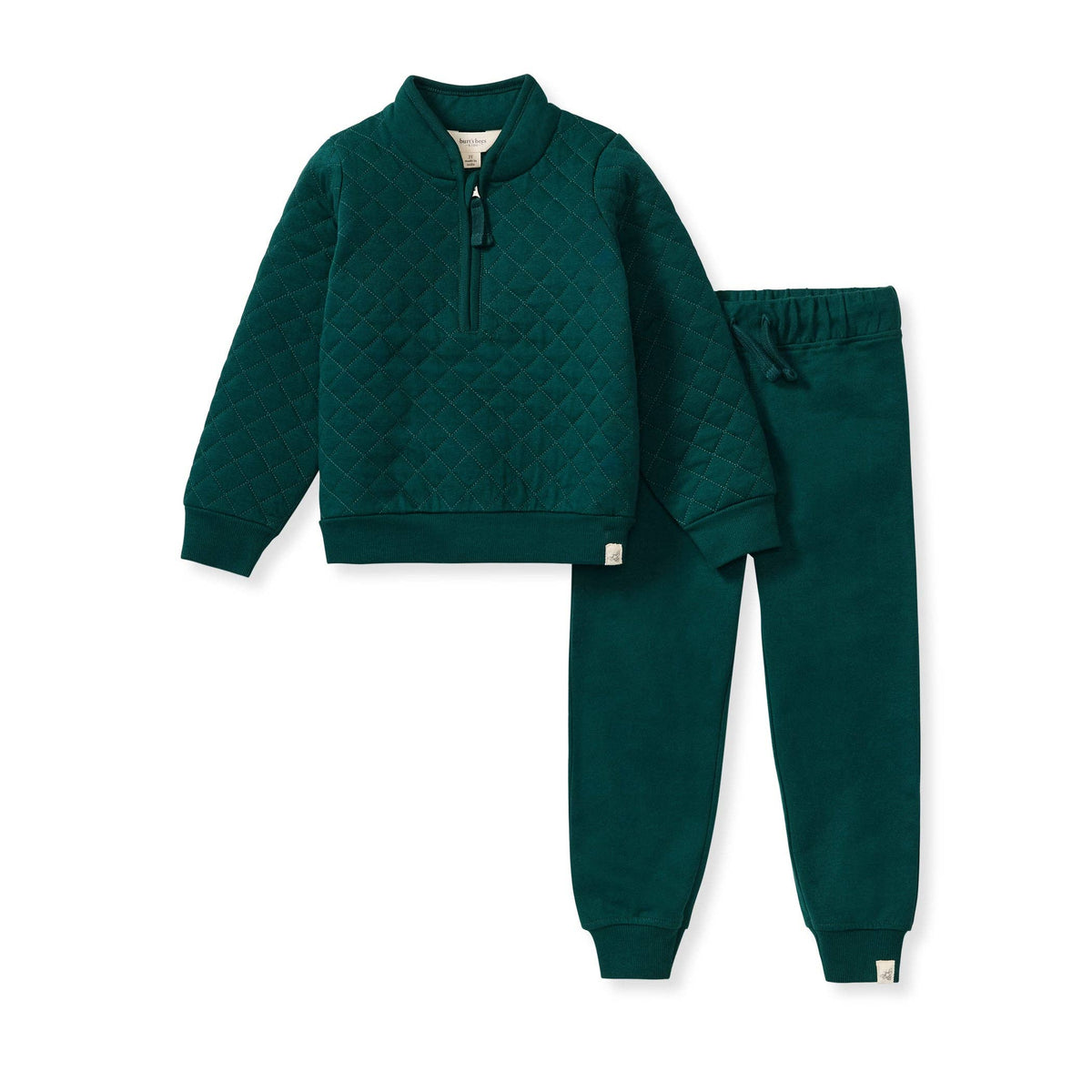 Green quilted quarter zip jogger set with against a white background. 