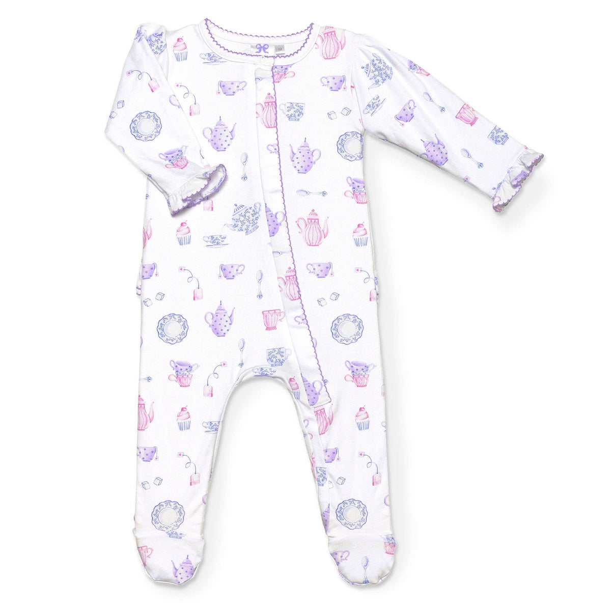 A baby onesie with a tea party print and ruffled trim against a white background.