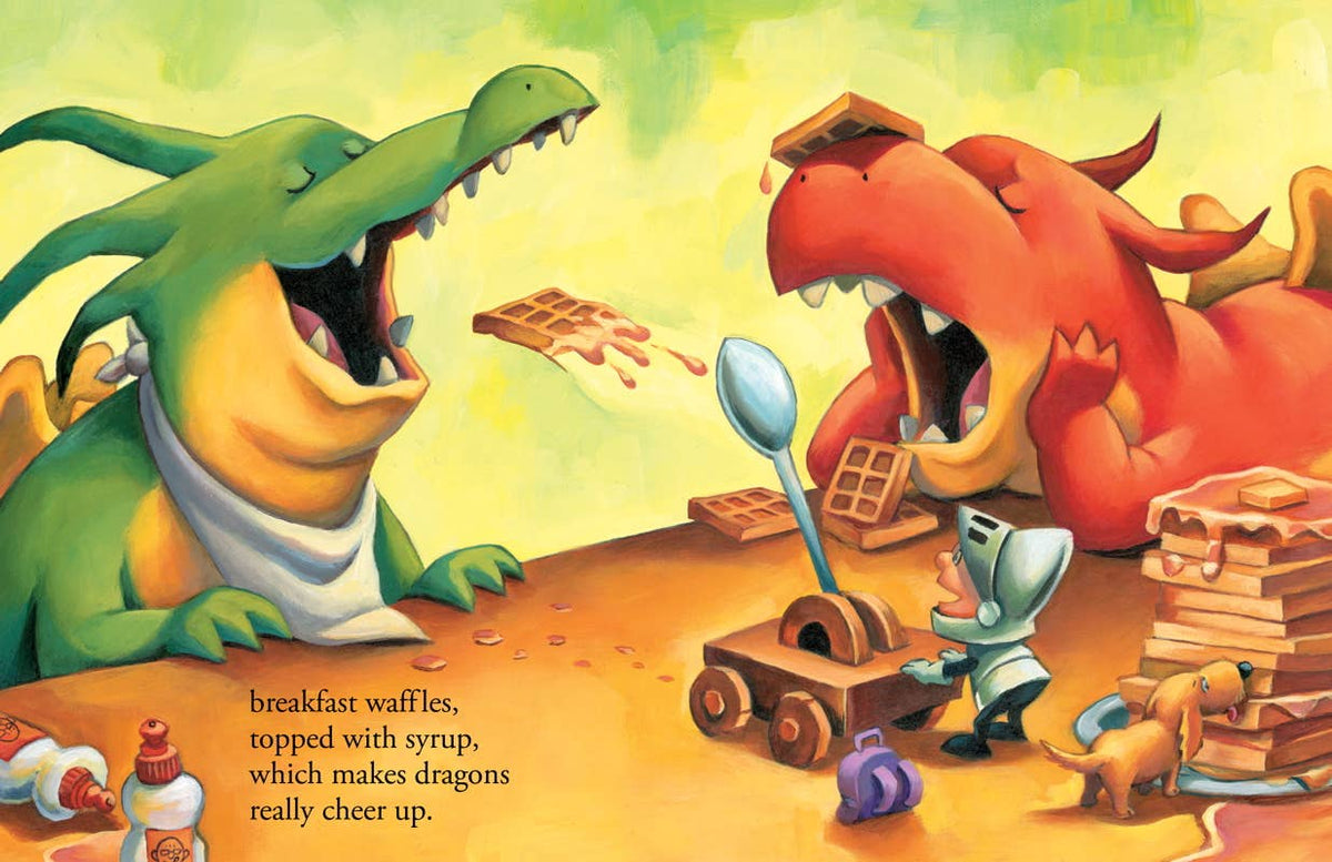A colorful children's book illustration showing two dragons eating chocolate waffles, with a small knight and a dog in the foreground. Text at the bottom reads, 'breakfast waffles, topped with syrup, which makes dragons really cheer up.