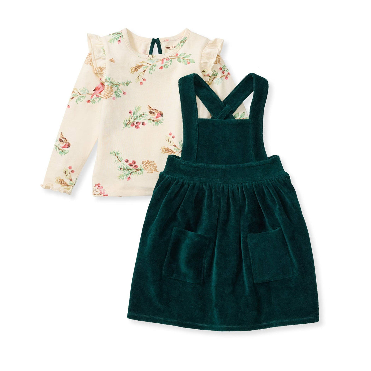 Dress set with soft green overall dress and long sleeve ruffle shirt with cardinals decorating it against a white background. 