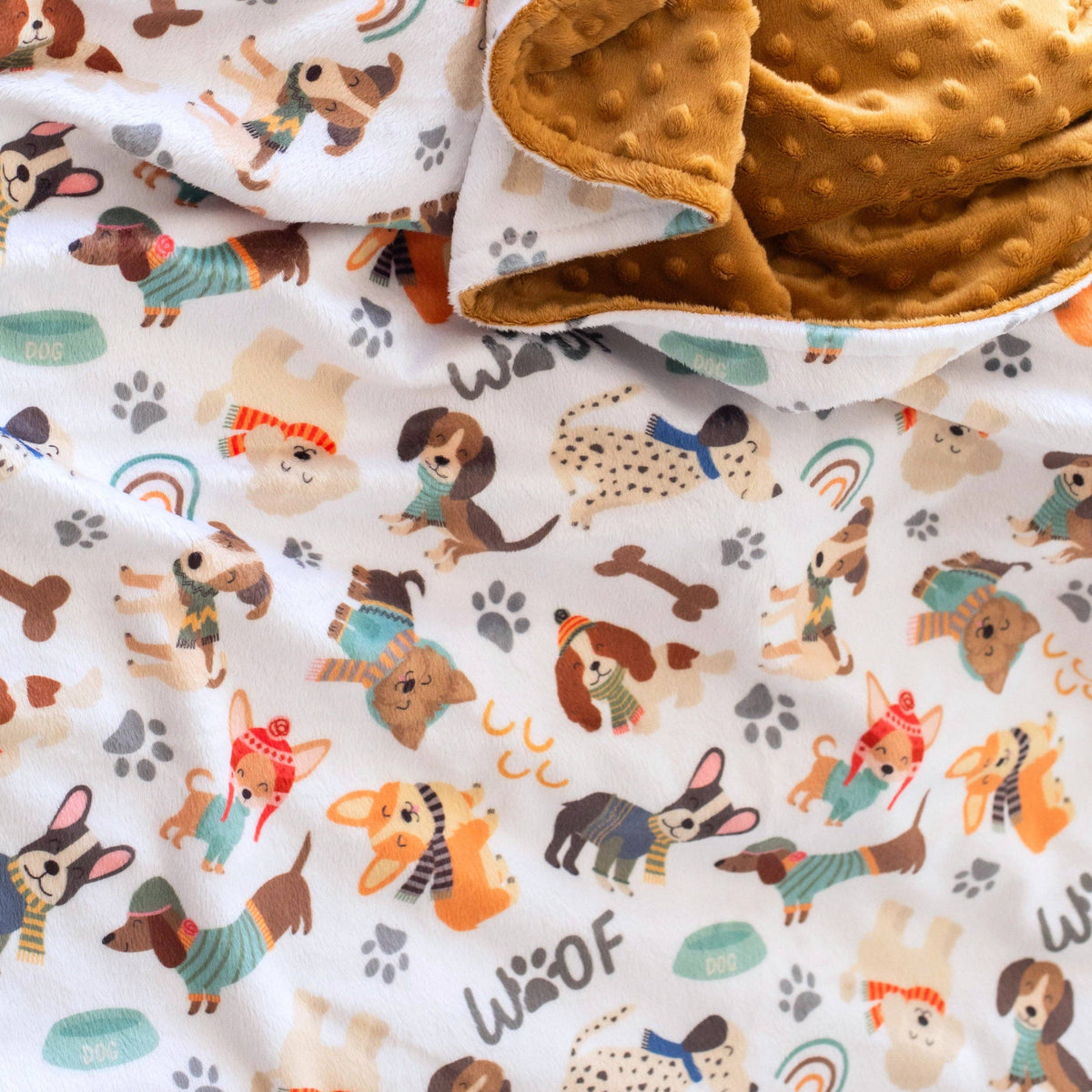 WInter dogs on a cozy white blanket with a reverse side of tan minky