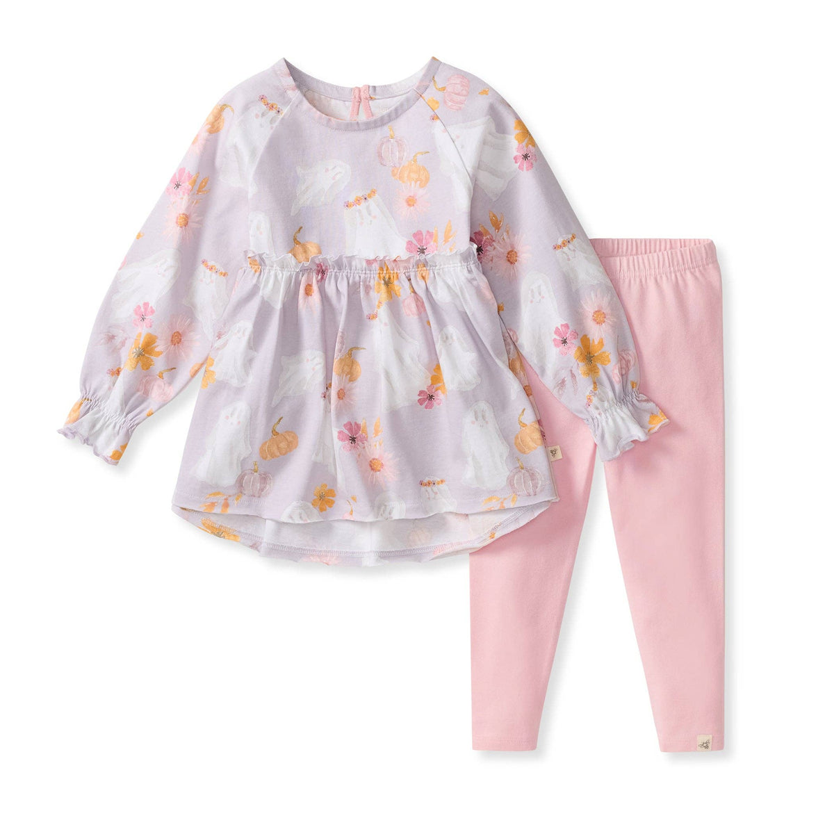 Children's outfit with floral top and pink pants on a white background