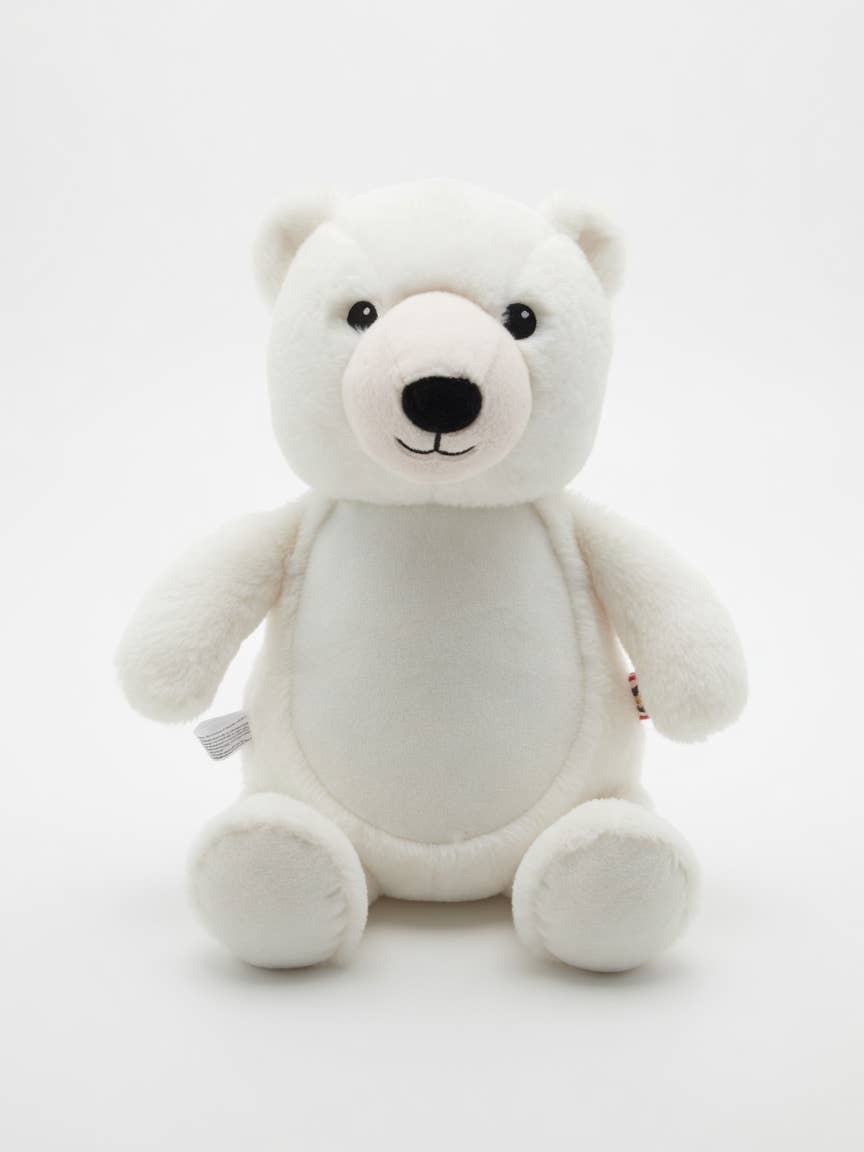 White polar bear with black nose and eyes sits on a white background